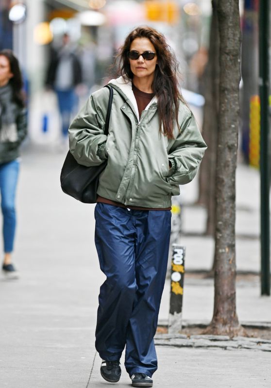 Katie Holmes in a Green Olive Rain Jacket and Navy Blue Rain Pants in NYC 02/27/2024