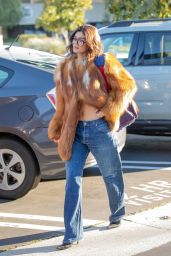 Kylie Jenner in a Large Fur and Jeans Exits a Calabasas Office Building 02/14/2024