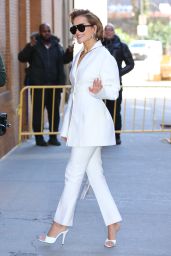 Rita Ora Wears a White Pant Suit and White Mules to The View in New York 02/16/2024