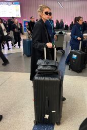 Stella Maxwell Arriving at Los Angeles International Airport 02/04/2024