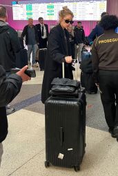 Stella Maxwell Arriving at Los Angeles International Airport 02/04/2024
