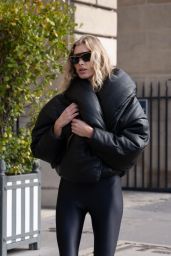 Stella Maxwell in a Black Catsuit and Oversize Puffer Jacket 02/27/2024