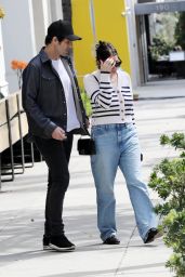 Ashley Benson With fiance Brandon Davis at Sugarfish in Beverly Hills 03/16/2024