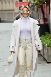 Ashley Roberts Wearing a Tight White Polo-neck Jumper and Leather Trousers in London 03/14/2024