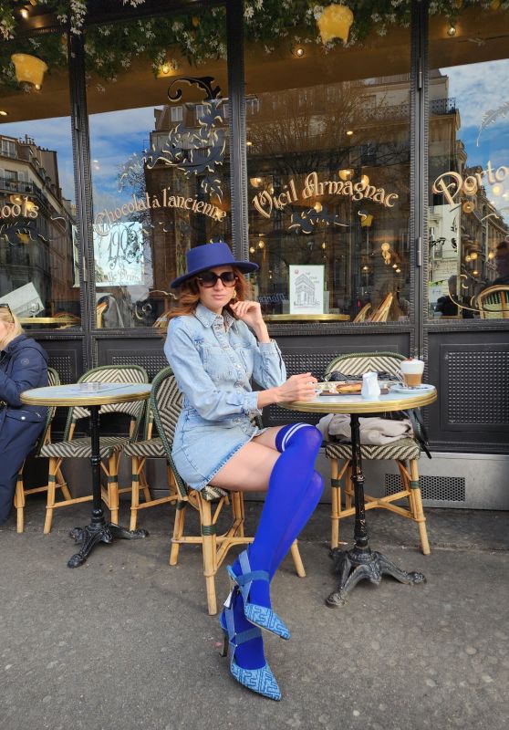 Blanca Blanco in a Denim Zara Dress, Fendi Heels and a Purple Hat in Paris 03/04/2024