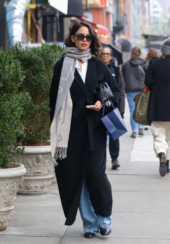 Eiza Gonzalez in a Trench Coat, Jeans and a Prada Scarf in New York 03/27/2027