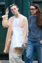 Elle Fanning on Shopping Trip With Mom in Soho 03/18/2024