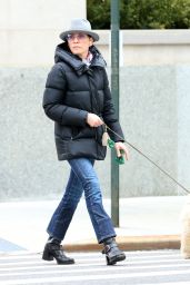 Julianna Margulies in a Stylish Fedora and Tinted Glasses in New York 03/20/2024