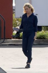 Kate Hudson Out On Set With Curlers in Her Hair 03/18/2024