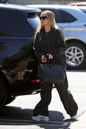Khloe Kardashian Dressed in Black 03/21/2024