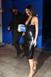 Kylie Jenner in a Low-cut Black Latex Dress at Catch Steak in West Hollywood 03/21/2024