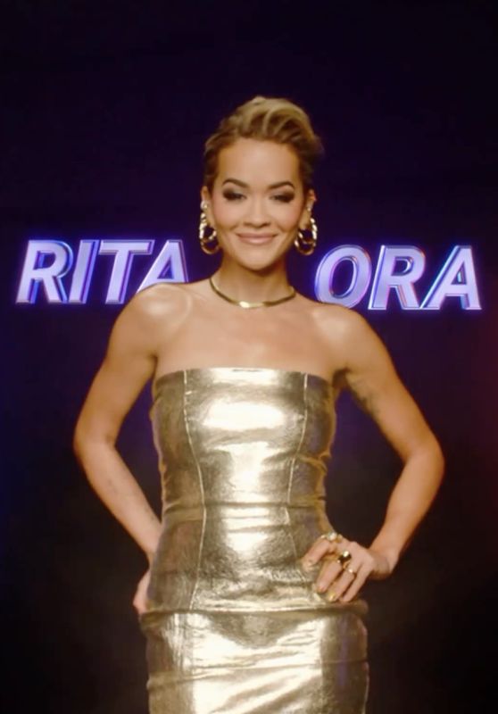 Rita Ora Wears Lavonne Leather Dress in Gold in a Recent Trailer for The Masked Singer February 2024