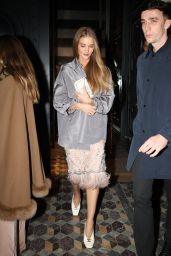 Rosie Huntington-Whiteley in a Pale Pink Jewel-encrusted Dress With Fringe Trim Paired With White Heels at Costes Restaurant in Paris 03/03/2024