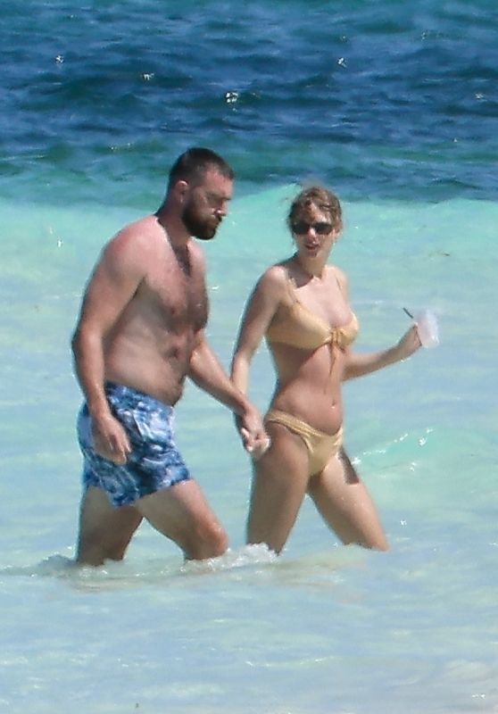 Taylor Swift in a Bikini at a Beach in The Bahamas 03/21/2024 (more photos)