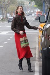 Whitney Port in a Red Dress and Leather Jacket 03/22/2024