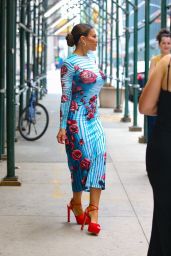 Dolores Catania Glamorous in a red-rose-embroidered blue dress and matching red heels in New York 04-29-2024