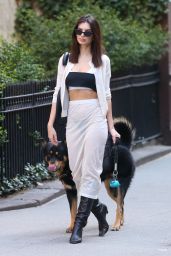 Emily Ratajkowski in a Sheer White Pencil Skirt, Crop Top and Short-waisted Jacket With Black Knee-length Noots in NYC 04-09-2024