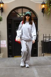 Emily Ratajkowski in Gray Sweats and a Green Cap Leaving Her Apartment in New York 04/11/2024