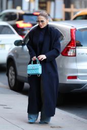 Jennifer Lopez in a Navy Coat With a Matching Chanel Purse and Gucci Aviator Sunglasses in New York 04/07/2024