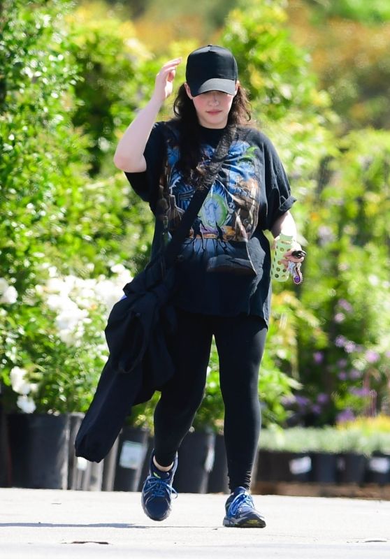 Kat Dennings in a Black Baseball Cap Paired With a Baggy Graphic Tee in Los Angeles 04-17-2024