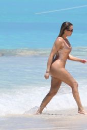 Khloe Kardashian in Metallic One-piece Swimsuit in the Turks and Caicos 04-03-2024