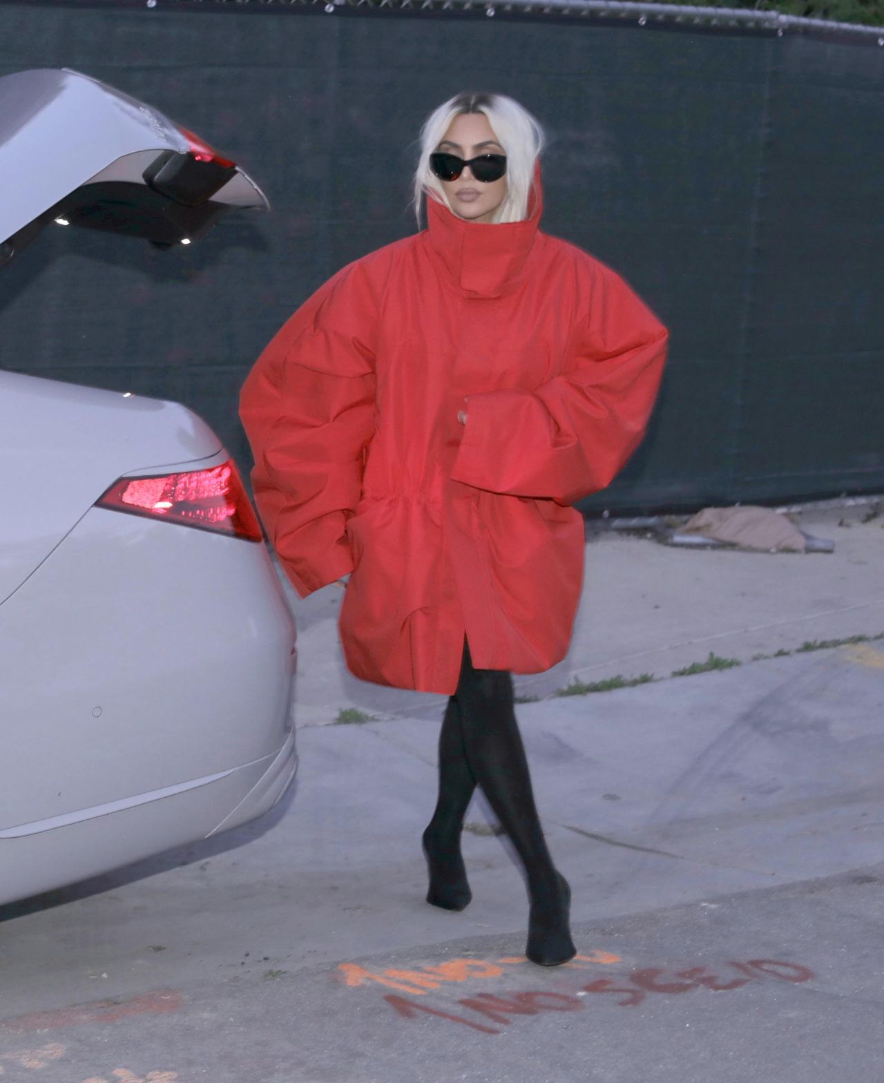 Kim Kardashian Debuts Chic Blonde Makeover and Oversized Red Coat in ...