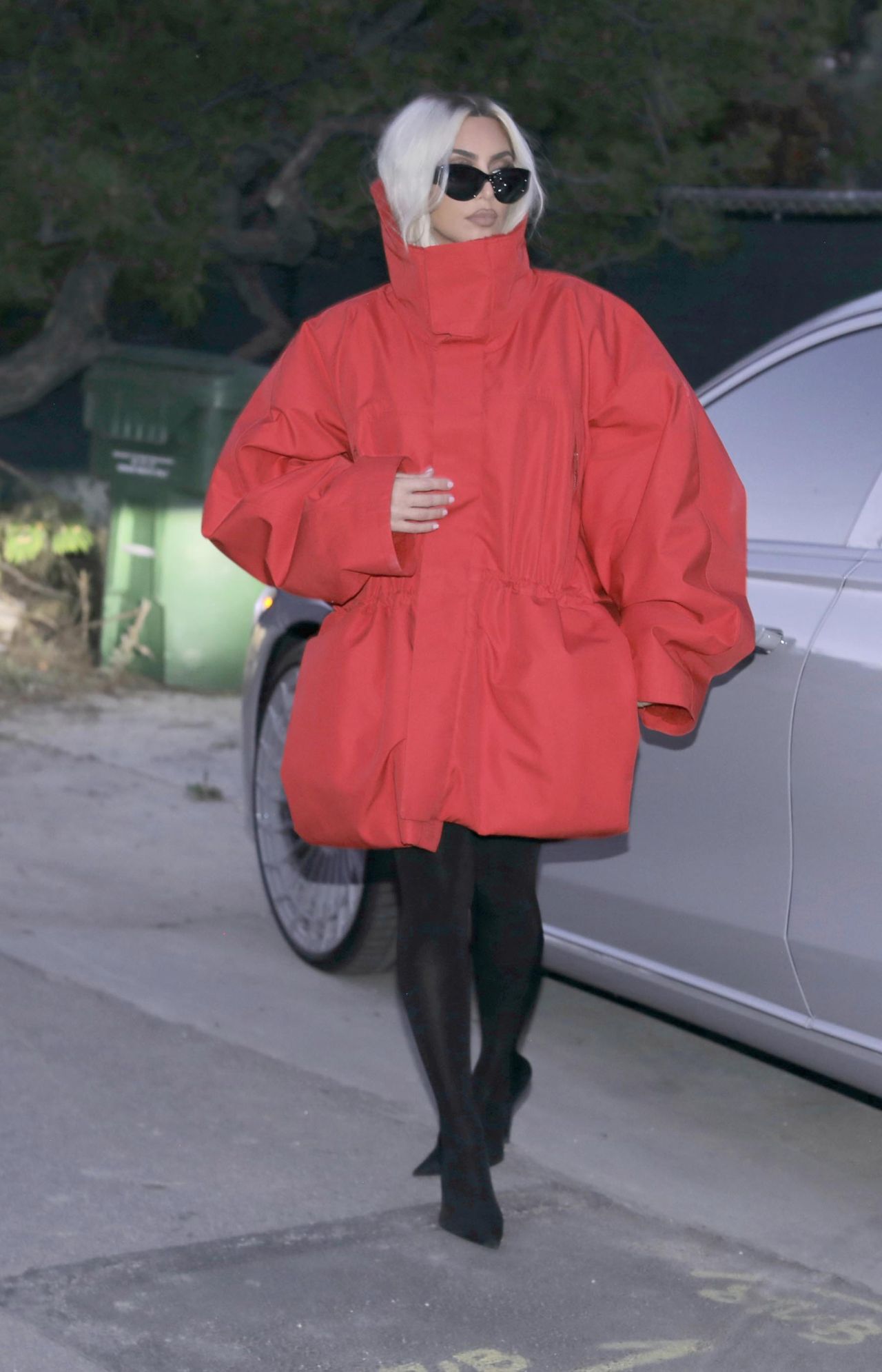 Kim Kardashian Debuts Chic Blonde Makeover and Oversized Red Coat in ...