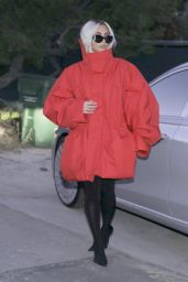 Kim Kardashian Debuts Chic Blonde Makeover and Oversized Red Coat in Malibu 04-26-2024