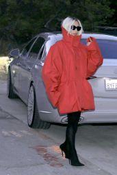 Kim Kardashian Debuts Chic Blonde Makeover and Oversized Red Coat in Malibu 04-26-2024