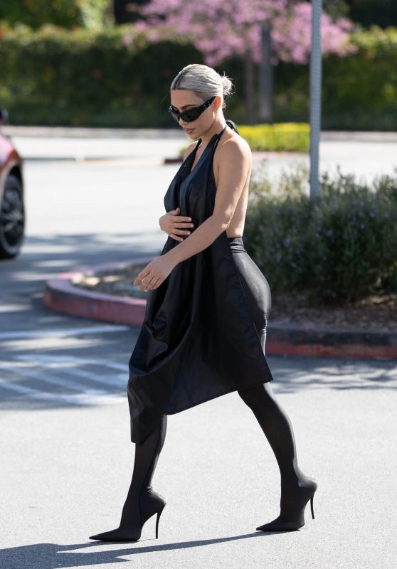Kim Kardashian Debuts Stunning Ice Blonde Hair Transformation in Woodland Hills 04-28-2024