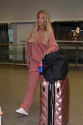 Molly Smith Makeup Free at Manchester Airport 04-16-2024