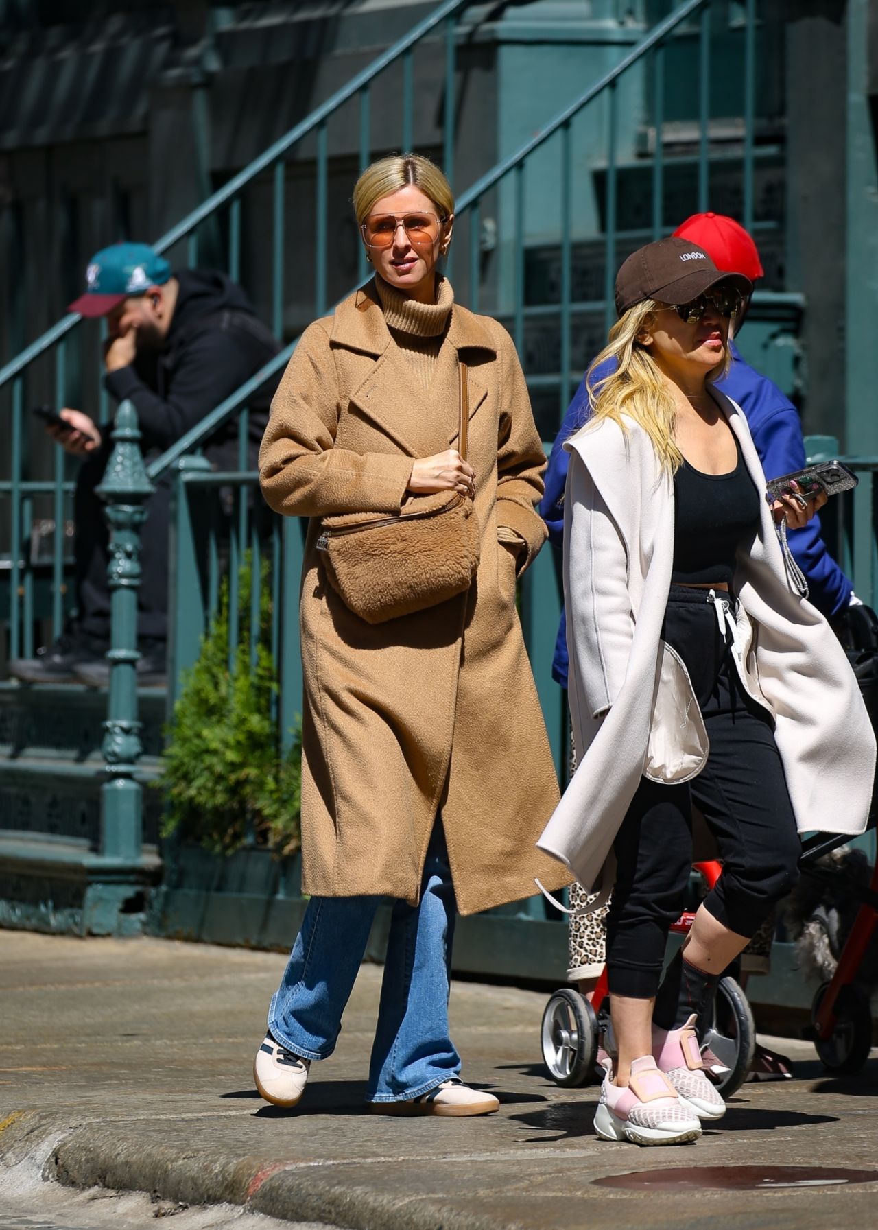 Nicky Hilton In Chic Camel Coat Ensemble Out In NYC 04-25-2024 • CelebMafia