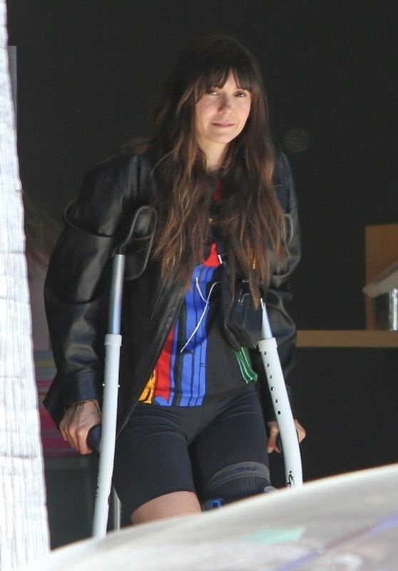 Nina Dobrev Using Crutches - Exited Fonuts Vegan Donut Shop in Los Angeles 04-27-2024