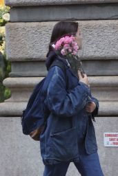 Suri Cruise With Pink Flowers in Hand in NY 04-17-2024