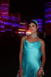 Taylor Hill in a Yellow and Blue Dresses at Cochella 04-14-2024