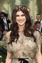 Alexandra Daddario Stuns with Serpentine Headpiece at 2024 Met Gala