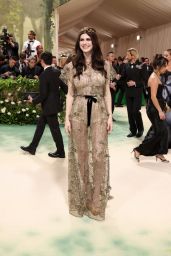 Alexandra Daddario Stuns with Serpentine Headpiece at 2024 Met Gala