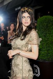 Alexandra Daddario Stuns with Serpentine Headpiece at 2024 Met Gala