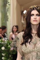 Alexandra Daddario Stuns with Serpentine Headpiece at 2024 Met Gala