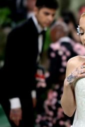 Ariana Grande Shines in Iridescent Ensemble at the 2024 Met Gala