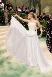 Ariana Grande Shines in Iridescent Ensemble at the 2024 Met Gala