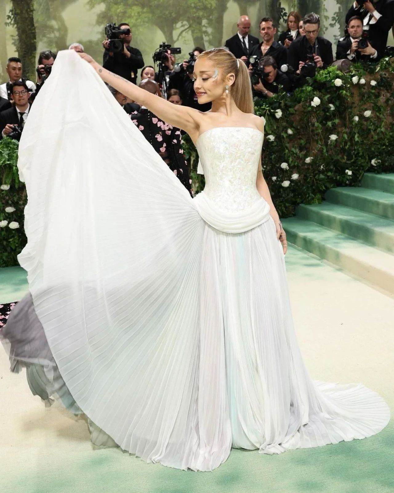 Ariana Grande Shines in Iridescent Ensemble at the 2024 Met Gala ...