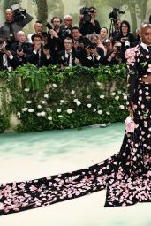 Ariana Grande Shines in Iridescent Ensemble at the 2024 Met Gala