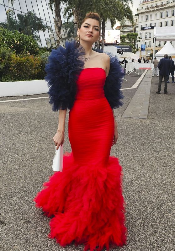 Blanca Blanco Wearing an Elegant Red Dress by French Designer Christophe Guillarmé in Cannes 05-15-2024