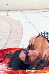 Claudia Romani on the Beach Showing Her lLve for Formula 1 in Miami 05-05-2024