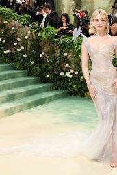 Elle Fanning Stuns in Ethereal Balmain Gown at the 2024 Met Gala