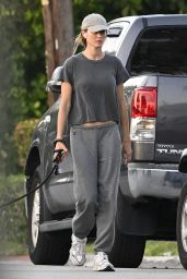 Gisele Bundchen Walks Her Dog Near Her Home in Surfside 05-08-2024