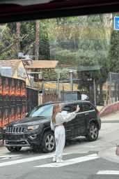 Jennifer Lopez Takes Selfies in Front of Her Own "Atlas" Billboard 05-24-2024