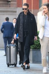 Karlie Kloss Rocks a Stylish All-Black Outfit as She Makes Her Way to the Airport in New York 05-07-2024