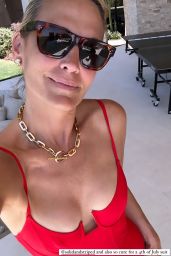 Molly Sims in a Red Swimsuit 05-27-2024